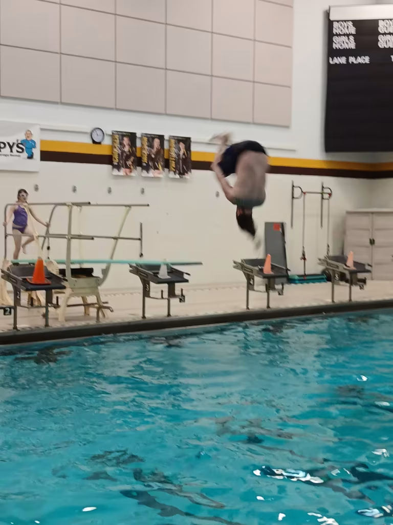 A pool with equipment on the side.